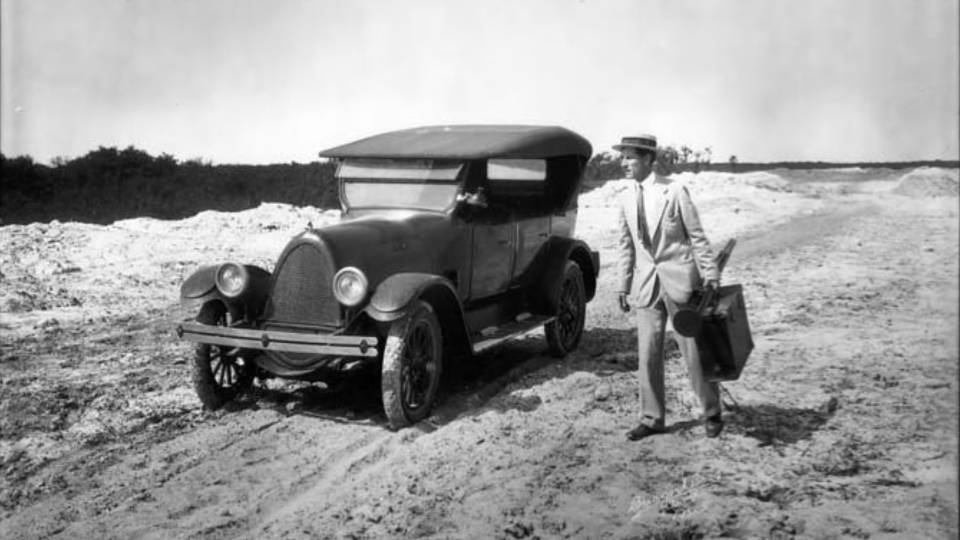 Al Burgert and first car on Davis Islands, Tampa, Fla. Courtesy, Tampa-Hillsborough County Public Library System.