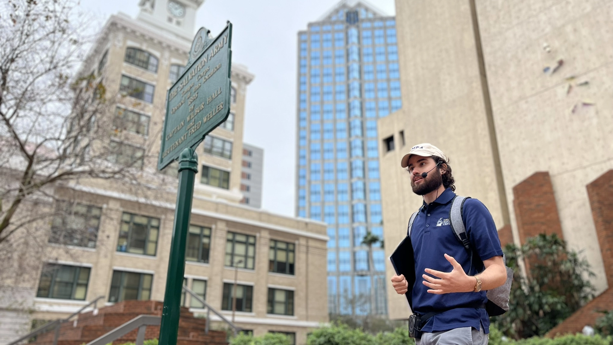 T.J. Chaltry leads a history walking tour in front of Tampa's Old City Hall on Feb. 17, 2024, delving into the city's storied past.