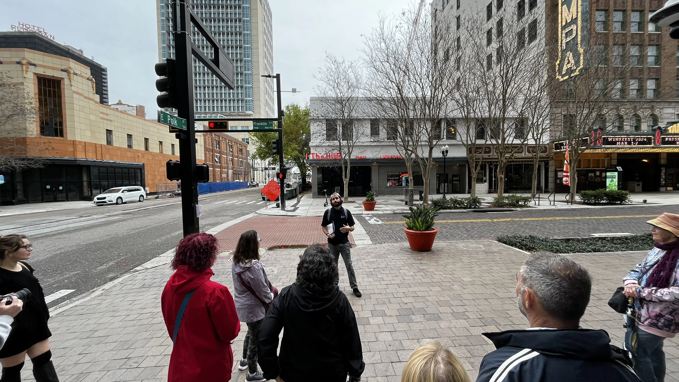 T.J. Chaltry leads a history walking tour in front of The Hub in Tampa, Fla., on Feb. 17, 2024.