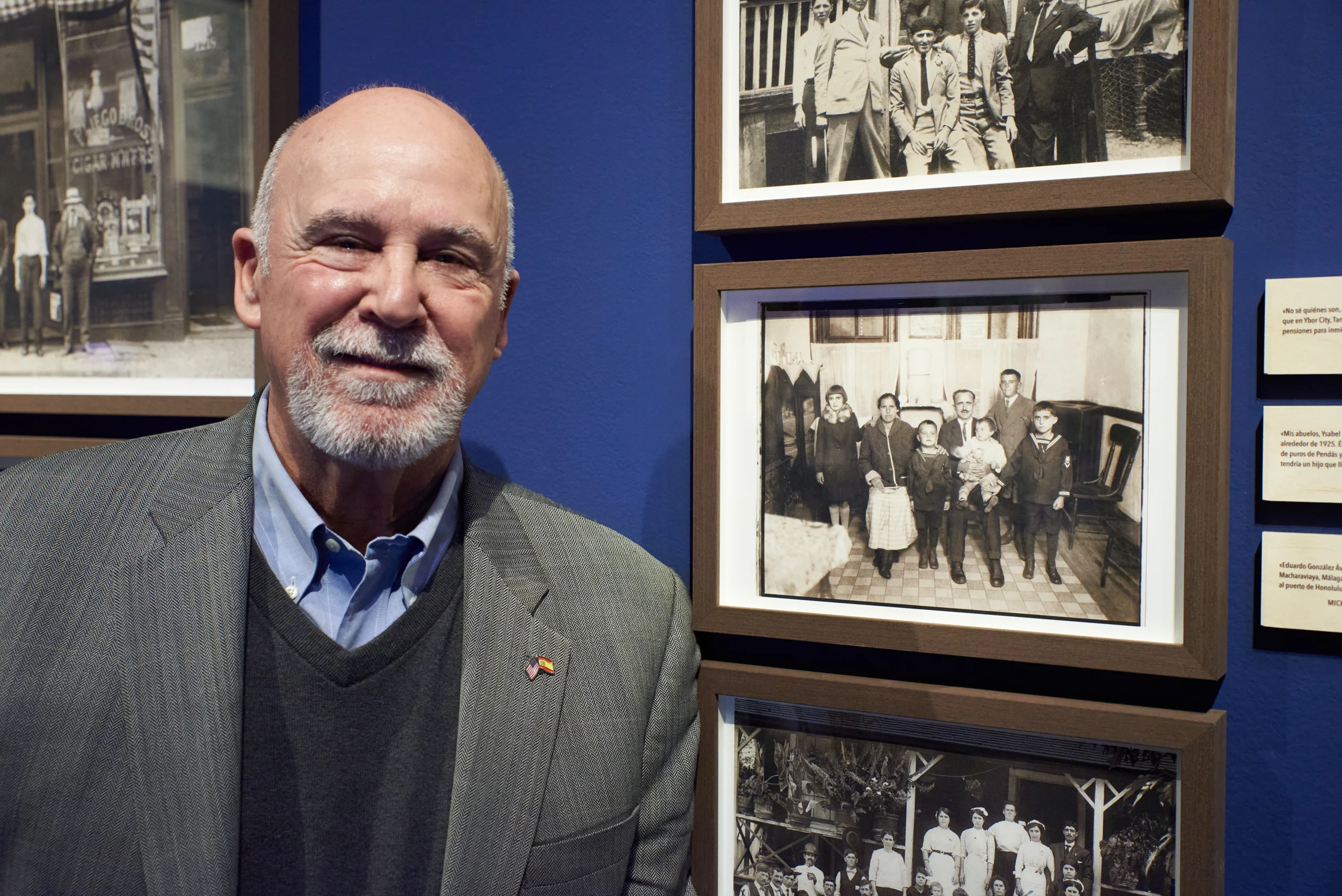 Tony Carreño poses in front of the family photograph he donated to the exhibition of the Asturian-born couple formed of Ysabel Fernández and Manuel Carreño?his paternal grandparents?and their five children in the living room of their home in Tampa, Florida, in 1925. (Photo by Fundación Consejo España - EE.UU./Juan de la Fuente)