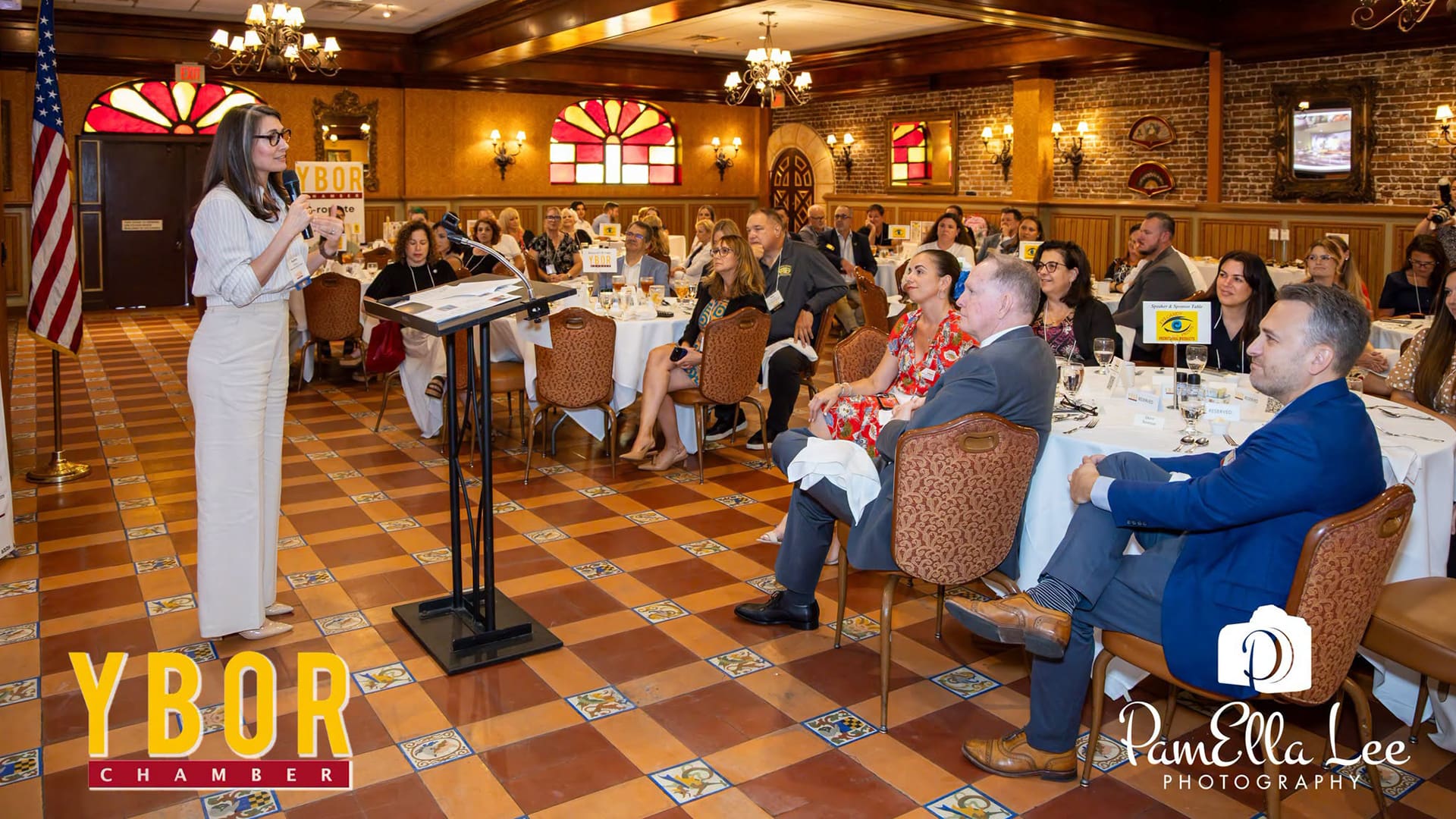 Audrey Chapuis addresses the audience during the Ybor City Chamber of Commerce luncheon Aug. 11, 2026, at Columbia Restaurant in Tampa, Fla.